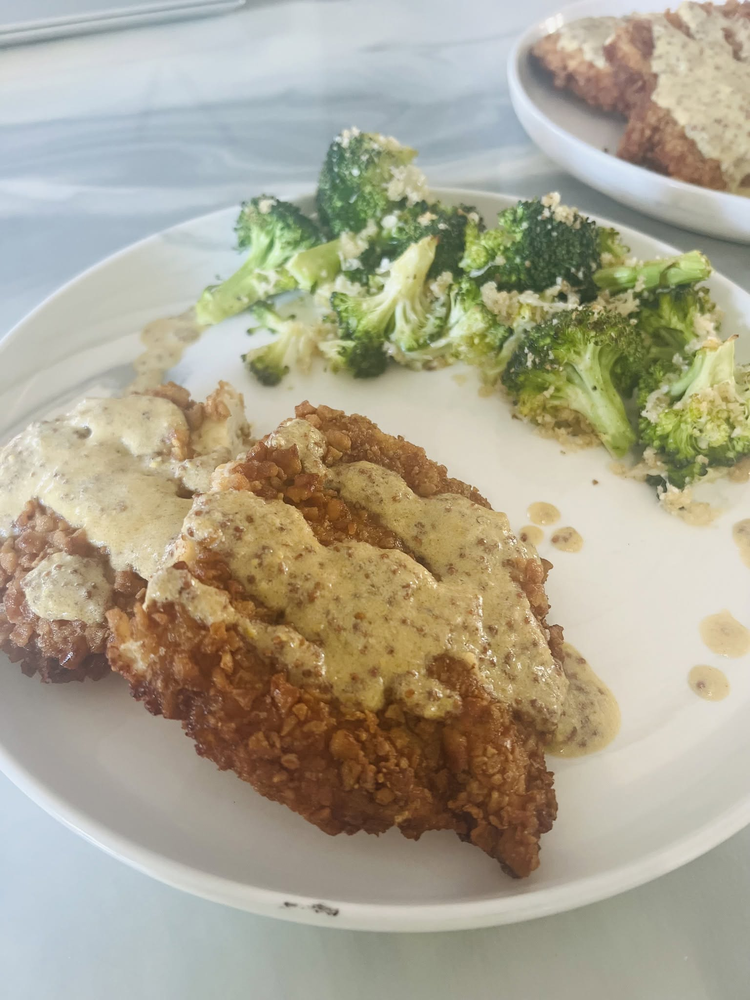 Pretzel-crusted chicken with creamy mustard sauce and broccoli